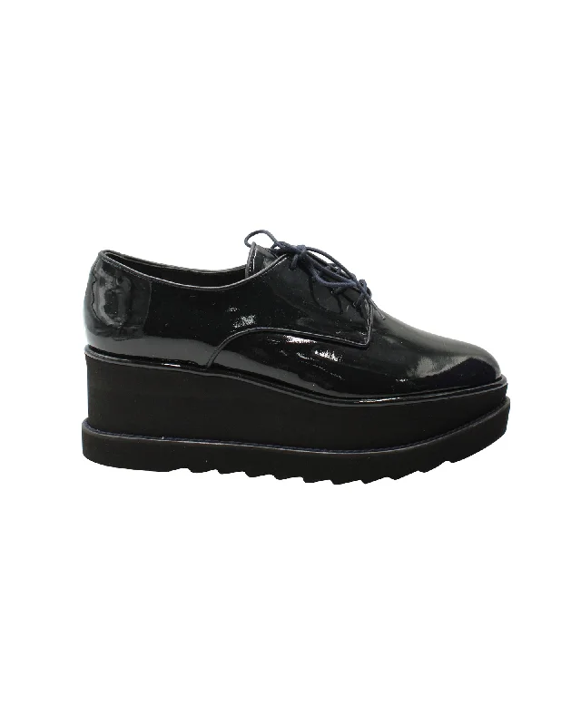 Stuart Weitzman Kent Platform Oxfords in Black Patent Leather